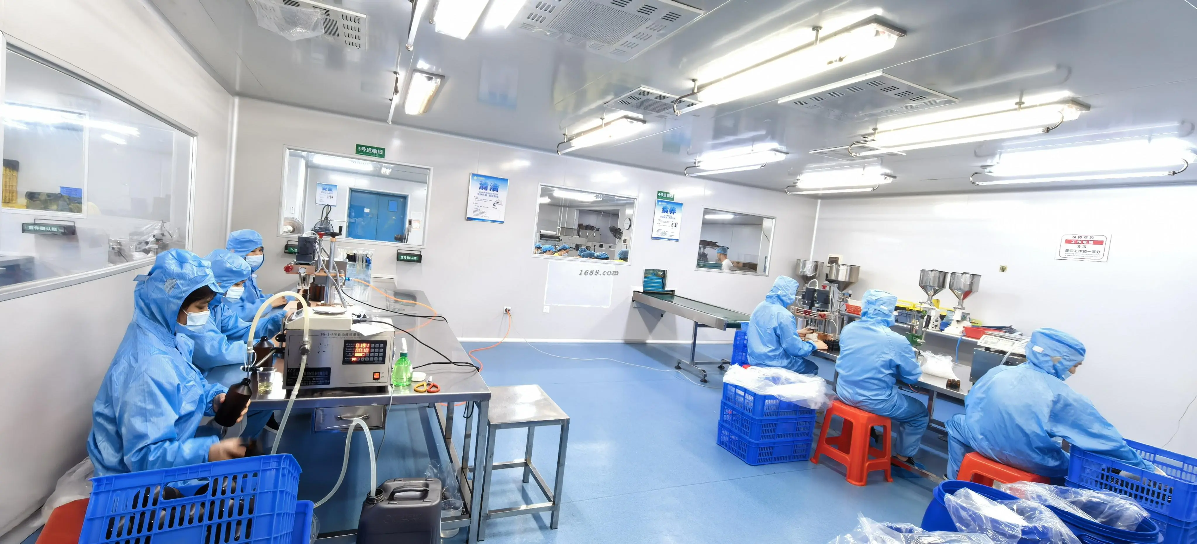 Workers completing in-house quality inspection procedures